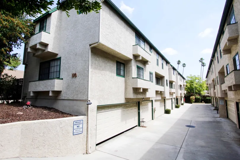 The garages for resident parking in Sierra Bonita Townhomes