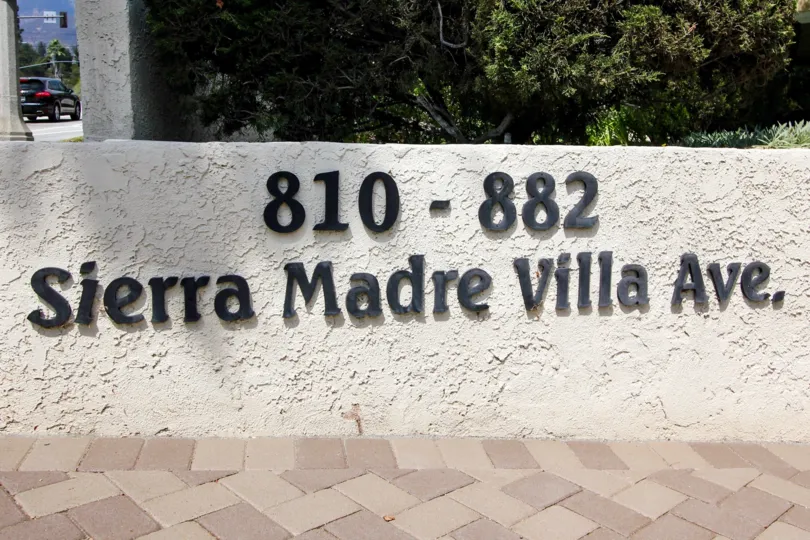 The sign and address for Sierra Madre Villa Ave in Pasadena, California