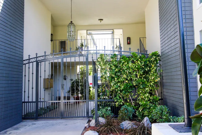 The gated entrance into Singing Woods
