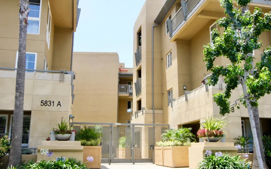 Number 5831 A building of Paraiso in playa vista with beautiful flowers.