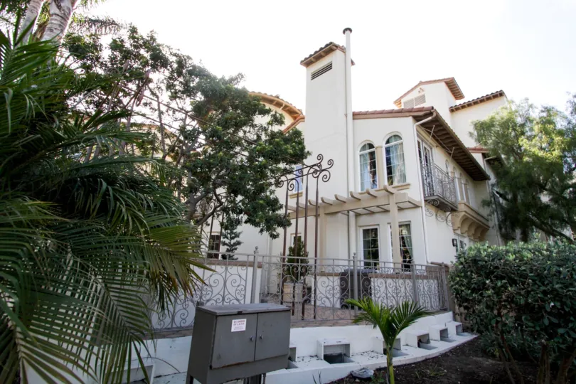 The fence around the Villa d Este Playa Vista property