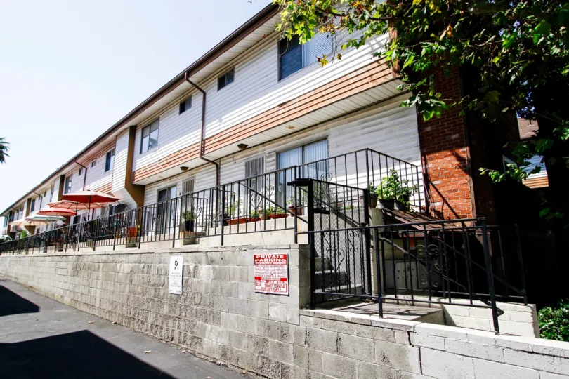 The patios for units at 7115 Etiwanda Ave