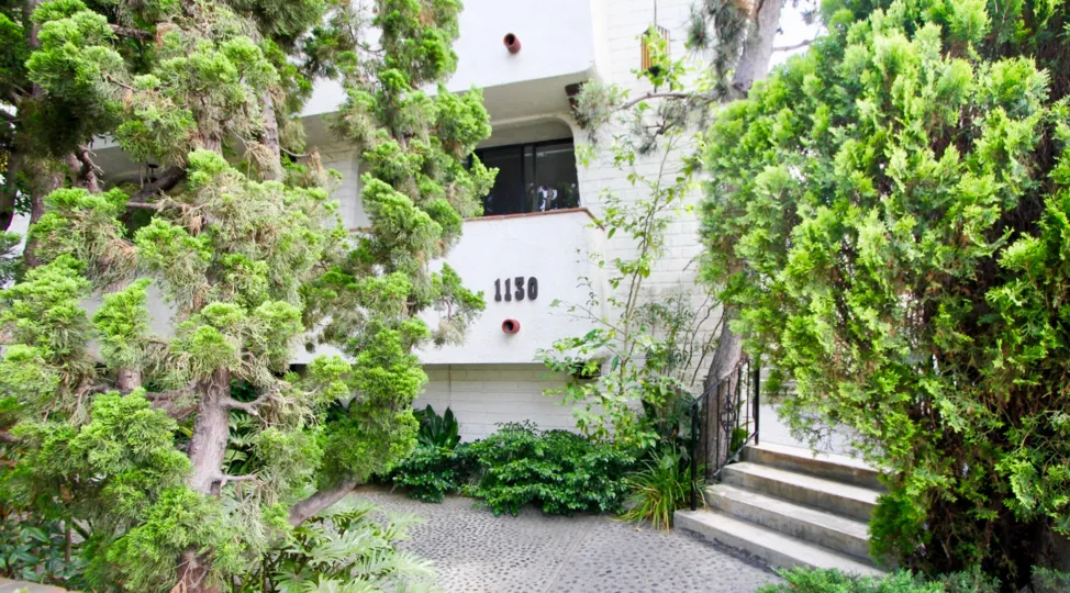 This 9th st community is nestled in a luscious green garden space