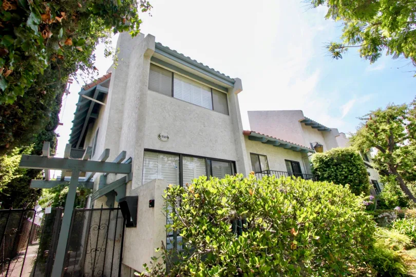 An entrance gate and side windows of a unit at 1144 17th St in Santa Monica, California