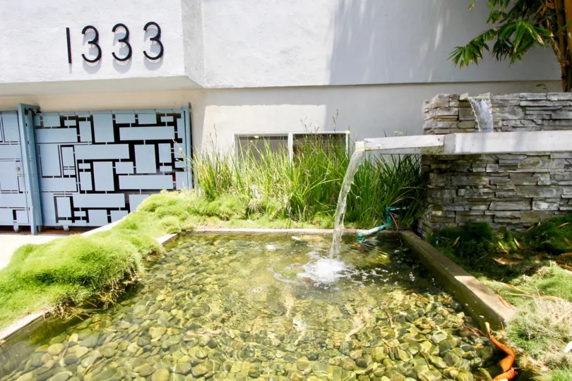 A pipe in 1333 14th st it's look like a short water fall.