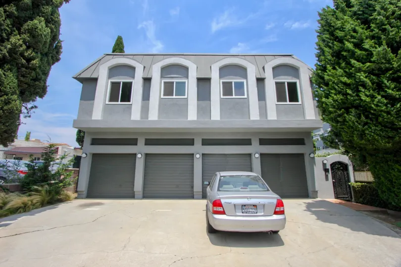 A two story home with 4 garages and 4 windows in sunny Santa monica.