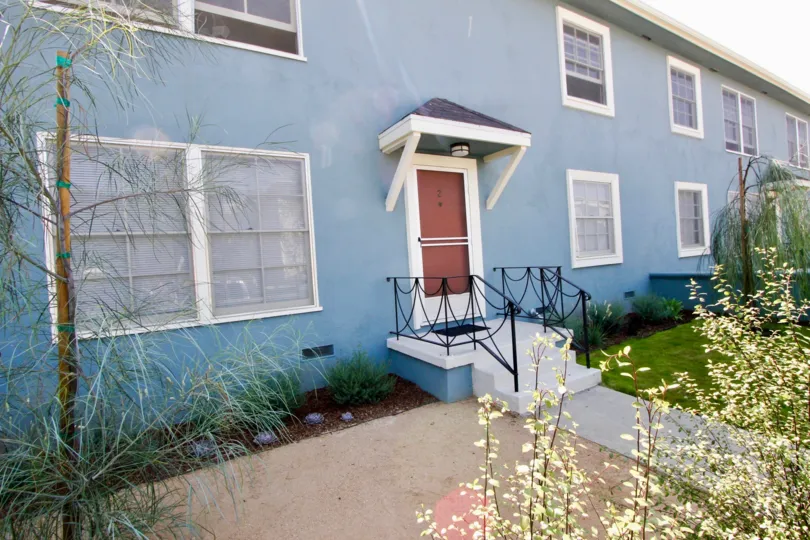 large gray building with many windows and rooms in California