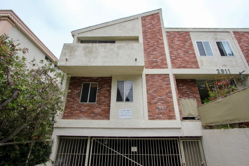 Brick home and balcony on a cloudy day at 2911 4th St in Santa Monica, CA