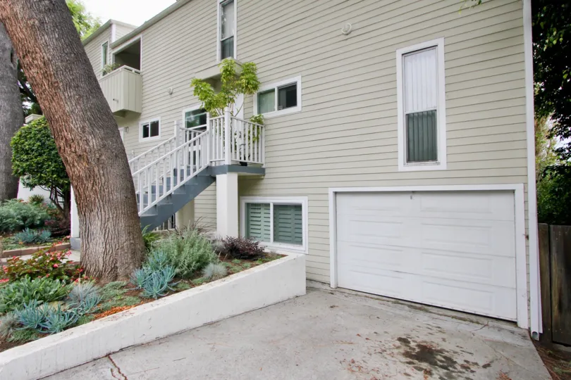 White Stairs and garage with a tree at 3101 Fith in Santa Monica