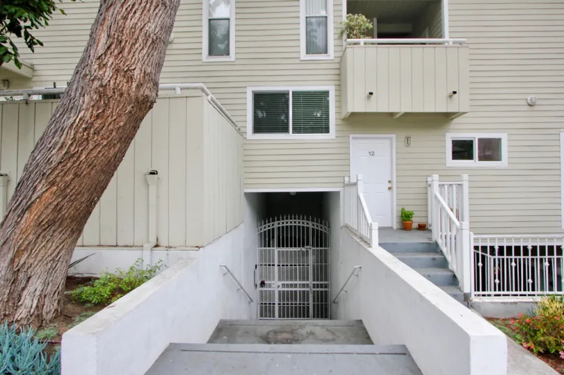The building is shaped like a squared S. The two extensions extend into a covered patio circling around half the house. The second floor is smaller than the first, which allowed for several small balconies on one side of the house. This floor has roughly 