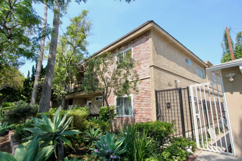 big building with many trees in California and metal working