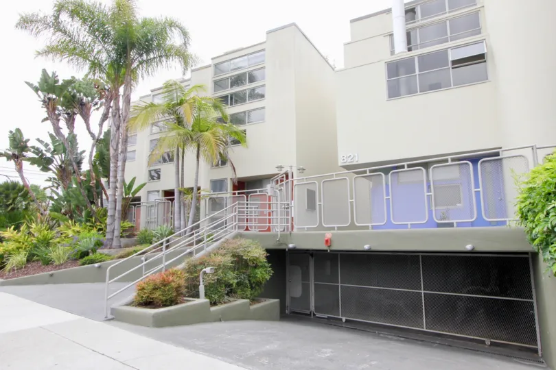 A low-rise housing with screened fence in 821 Bay St. community.