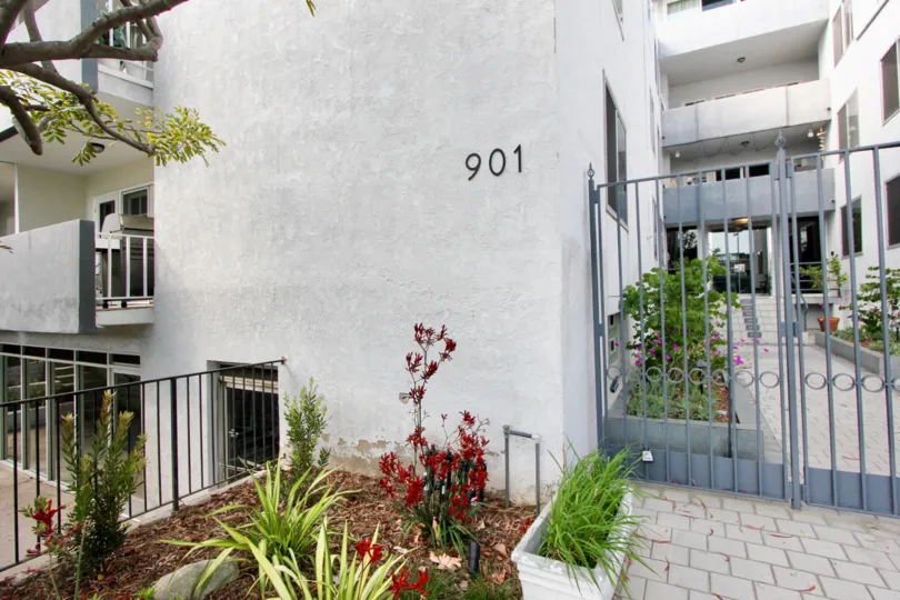 a beautiful white building in the 901 10th Street whit a grey door