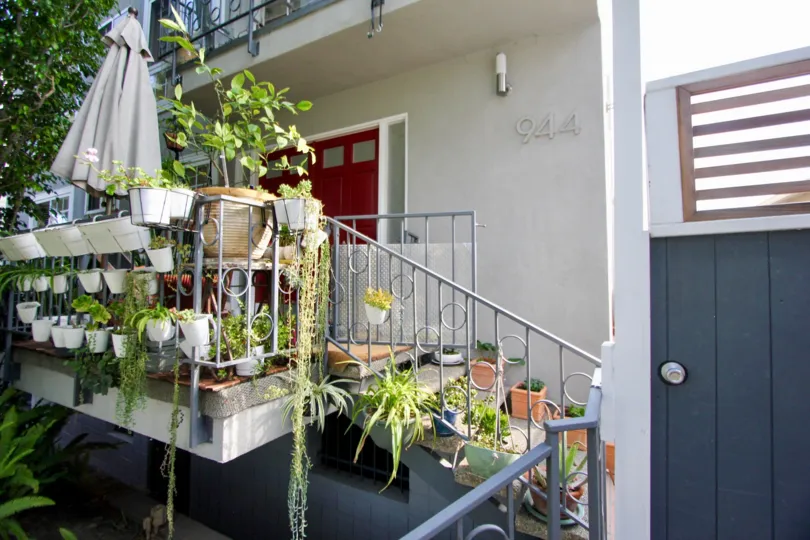 A home in the 944 11th St has so many flower pots with small Plants on it so it looks very attractive and greeny.