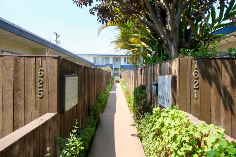 A clear day in the Centinela Condos with wooden wall.