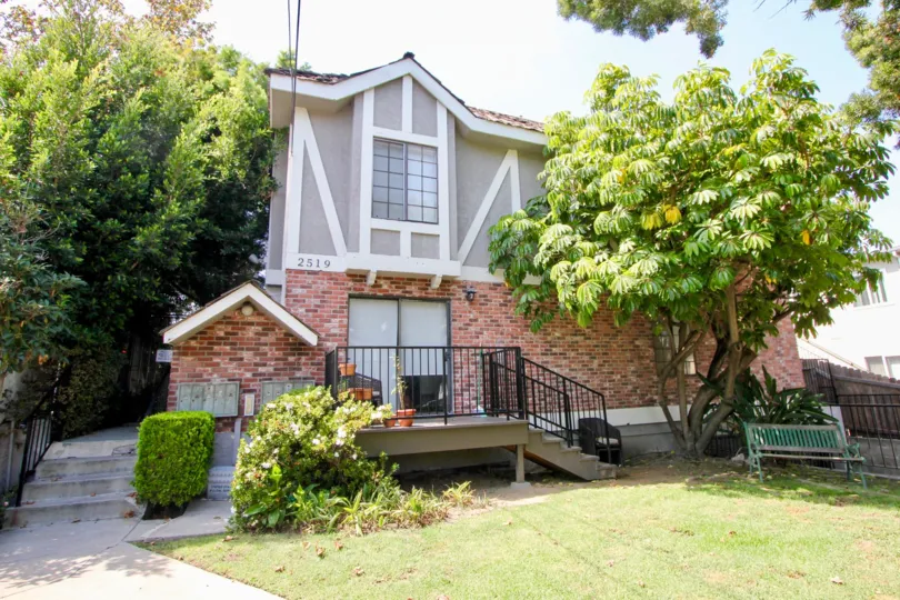 A Coventry house in the downtown of Santa Monica with tree attached to it.