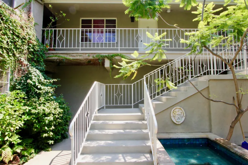The house in the garden state has a small swimming pool near the staircase which is very attractive.