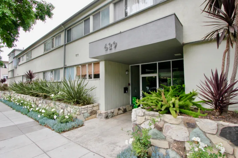 The Idaho Arms apartment is looking so good and the entrance are very nice with plants and trees