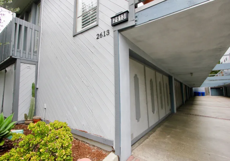 Side of a grey home and porch in Ocean Park Plaza in Santa Monica