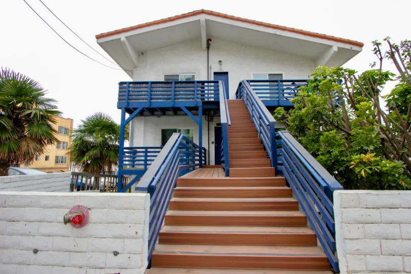 Steps with blue railing on an overcast day in Ocean View, Santa Monica, CA