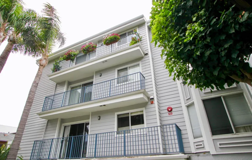 house with flower pots on balcony in Pacific Gardens