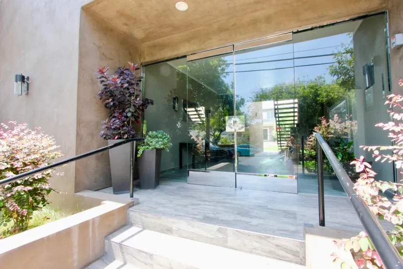 Entry of a large building in santa monica with glass doors