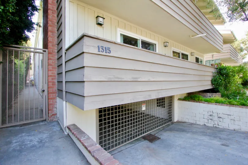 Lower level garage entry and side entrance to 1315 Stanford Street, Santa Monica, California