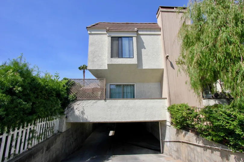 The front entrance of Stanford Townhomes withclosed glass windows