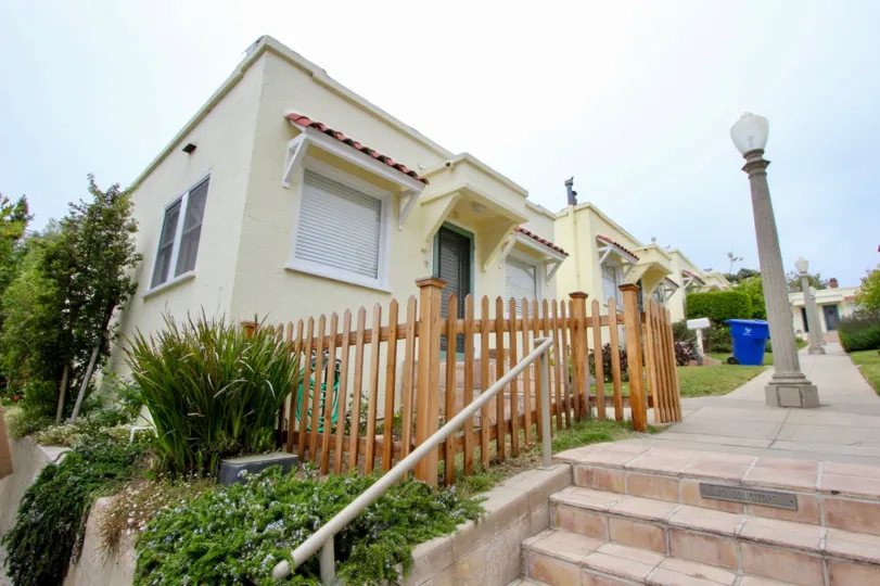 Sunshine Court's classy street and home with wooden fence, Santa Monica, California