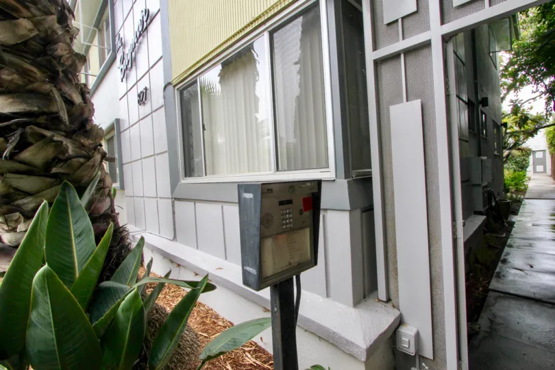 Secure keypad and intercom entrance to the Baymer apartment