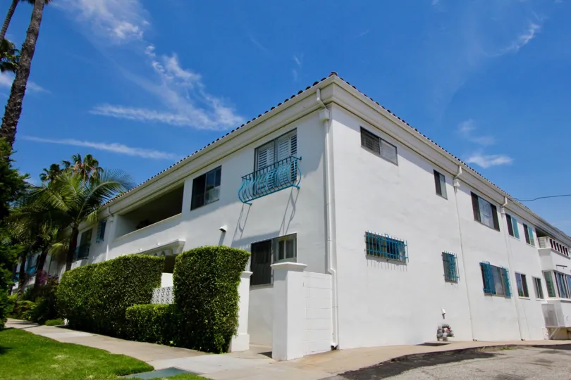 A bright day in the The Mediterranean with a white color apartment and blue sky.