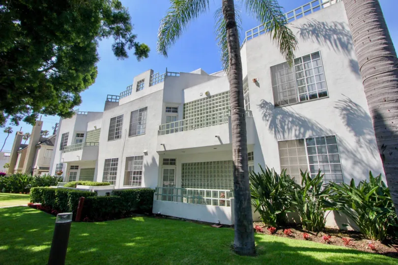 The side of white apartments and their balconies at The Stanford in Santa Monica, Ca