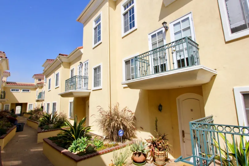 View from the walkway of the Yale Street Townhomes on a sunny day.
