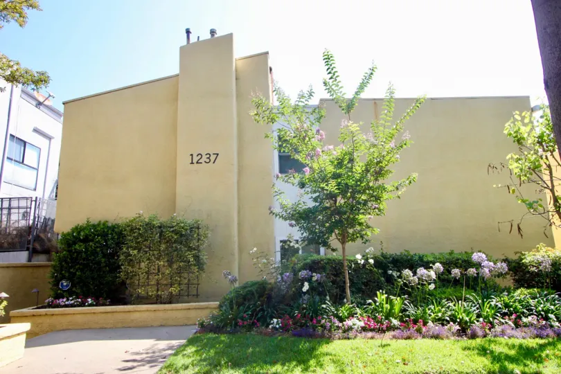 The side of a building with the sun shining at Yale Villas in Santa Monica, CA