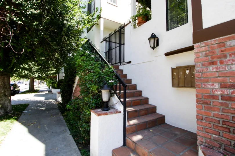 The stairs going into 14014 Milbank St