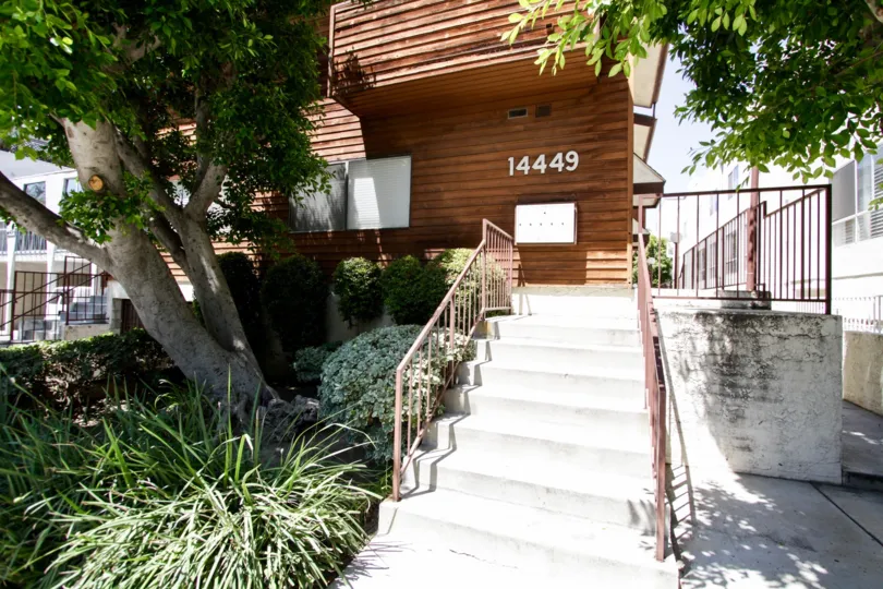 The stairs leading up to 14449 Benefit St