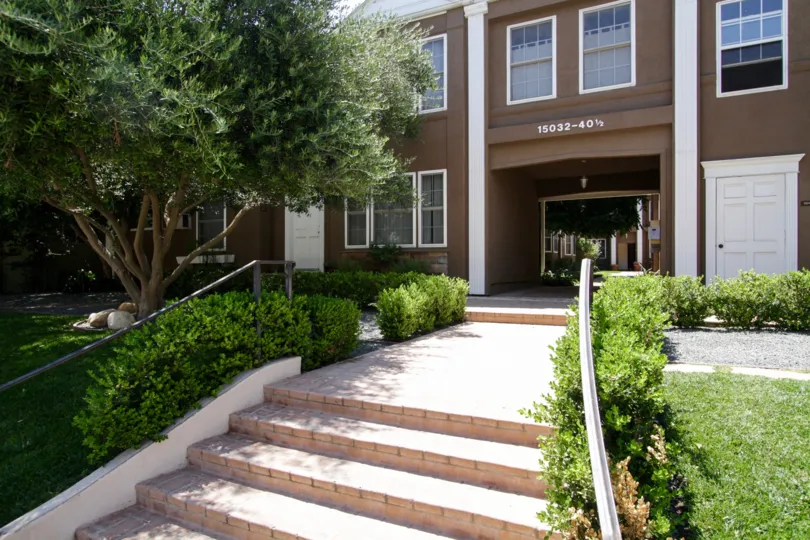 The stairs entering up to 15032 Dickens St