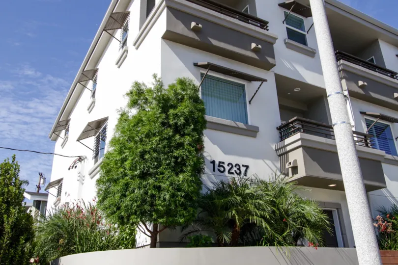 The address written on the building at 15237 Weddington St in Sherman Oaks