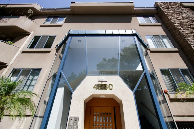 The window above the entrance into 4230 Stansbury Ave