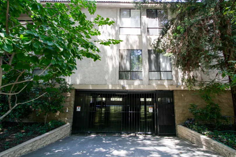 The gate for entrance into the parking option at Benefit Condominiums