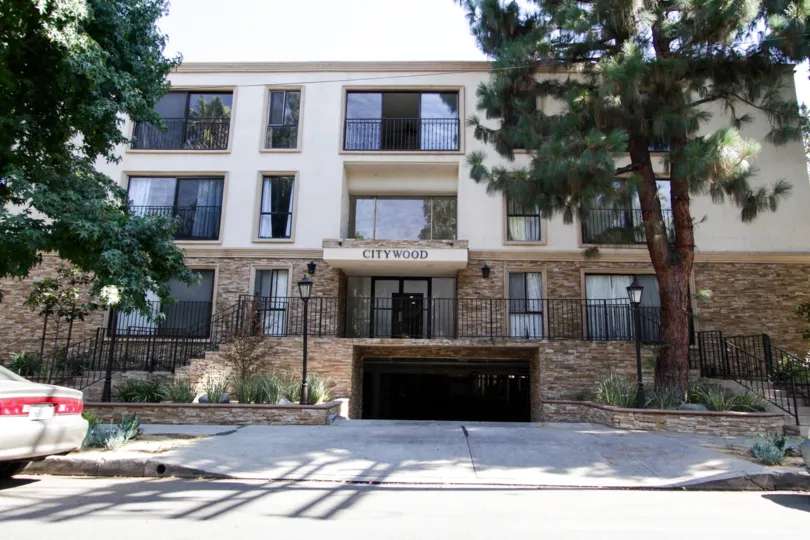 The sidewalk in front of Citywood Condominiums
