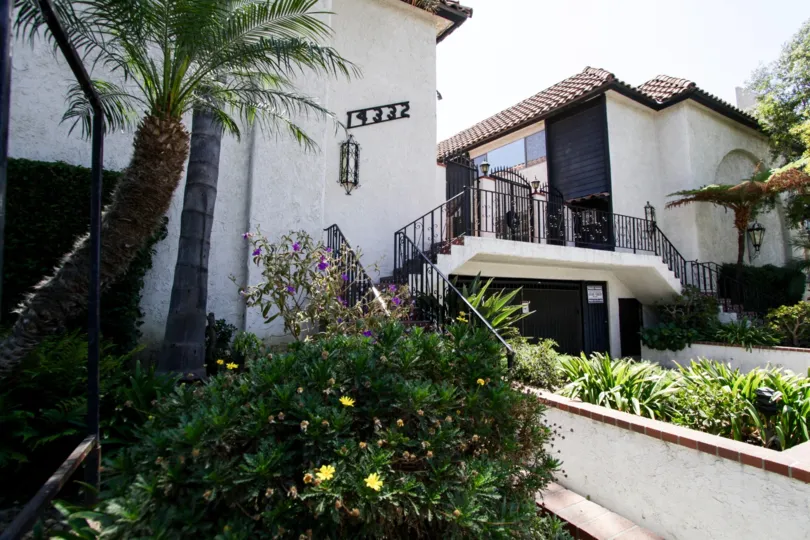 The stairs leading up to Dickens Street Townhomes