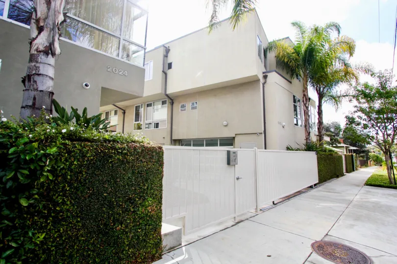 The fence around Allesandro Palms for privacy