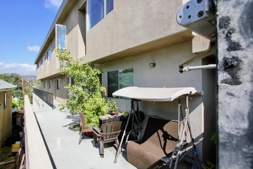 The patios outside of Monroe Heights units