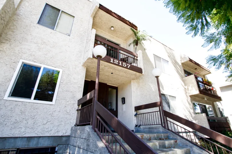 The address seen at 12157 Moorpark St on the building