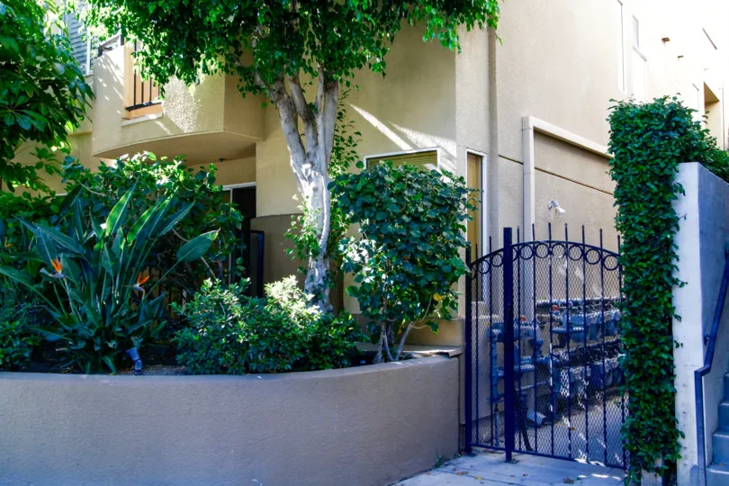 The gate to the side of 12633 Moorpoark in Studio City