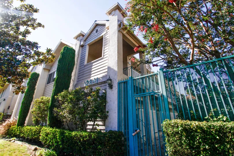 The gated entrance into 12841 Woodbridge St