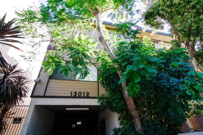 The address of 13012 Valleyheart Dr written on the building