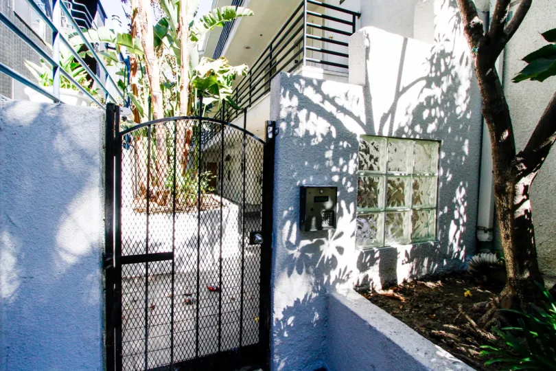 The gate for an entrance into 4212 Whitsett Ave