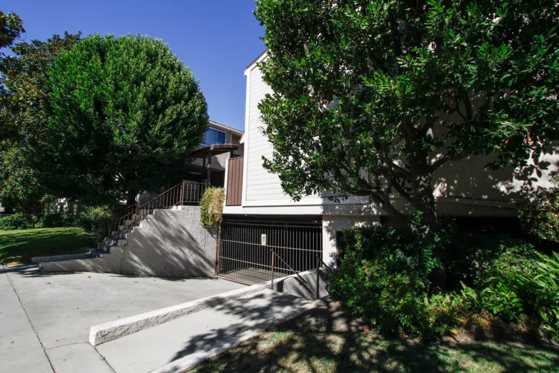 The driveway into the parking structure of 4230 Whitsett Ave